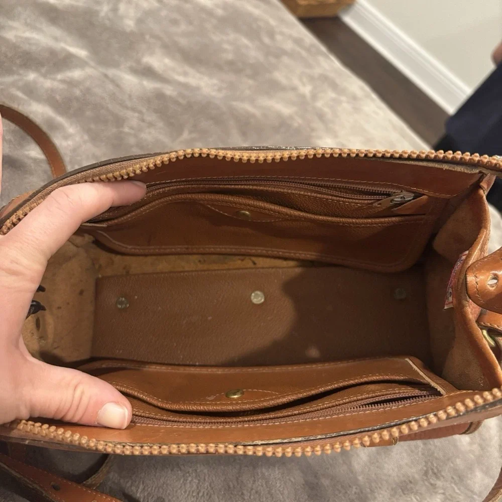Dooney & Bourke flaws missing